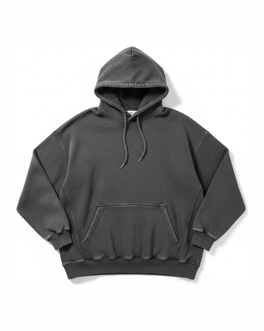 The hoodie's catalog photo: a charcoal oversized hoodie on white